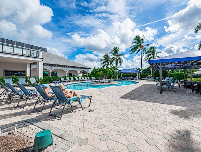 view of swimming pool featuring a gazebo and a patio area