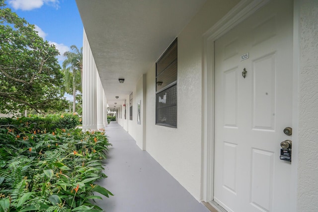 doorway to property featuring a porch