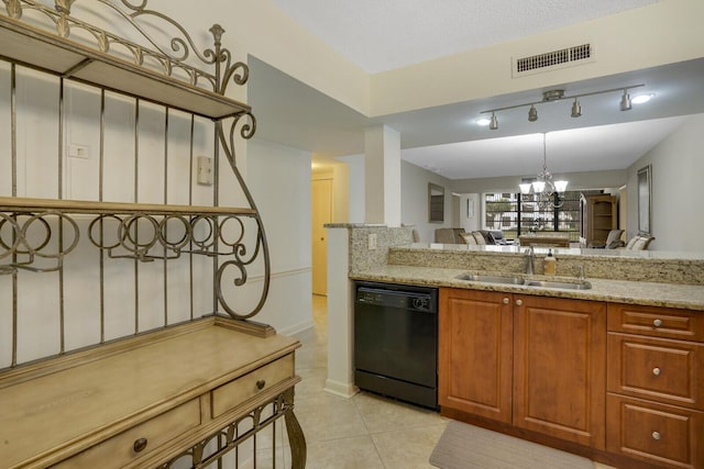 kitchen featuring light stone counters, sink, light tile patterned floors, a notable chandelier, and black dishwasher