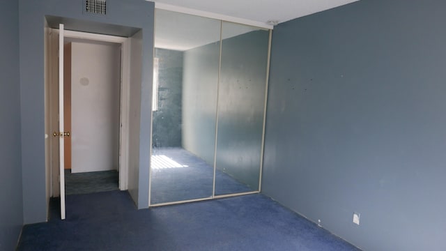 unfurnished bedroom featuring a closet