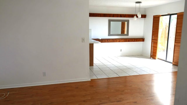 empty room with light wood-type flooring