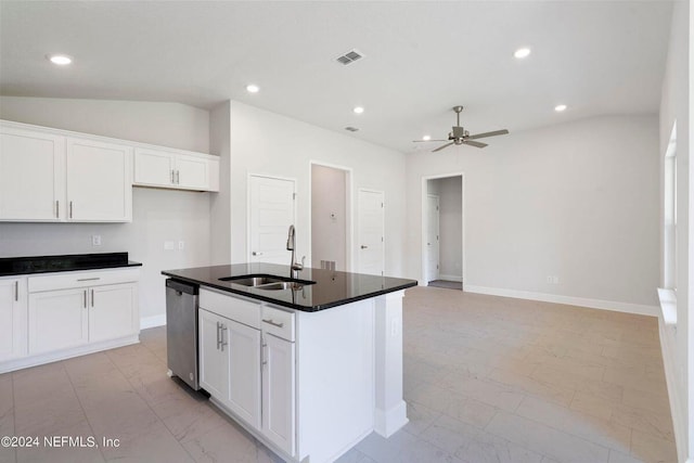 kitchen with vaulted ceiling, sink, a center island with sink, dishwasher, and white cabinetry