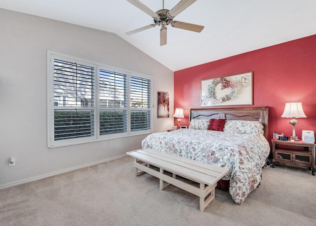 carpeted bedroom featuring ceiling fan and lofted ceiling