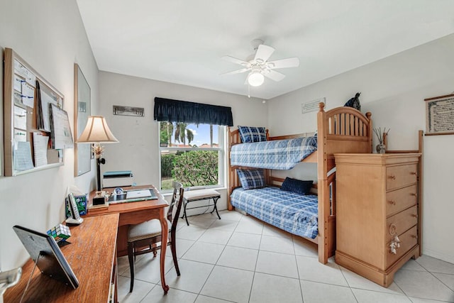 bedroom with ceiling fan and light tile patterned floors