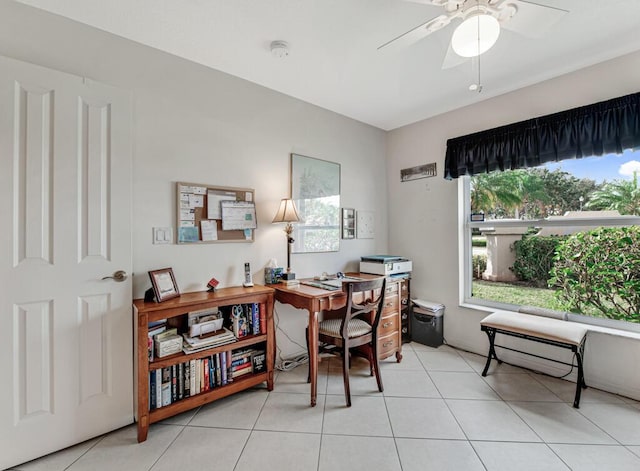 office space with ceiling fan and light tile patterned floors