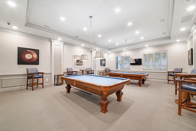 game room featuring a tray ceiling, light colored carpet, pool table, and crown molding