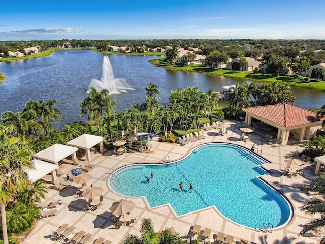 view of pool featuring a gazebo, a water view, and a patio