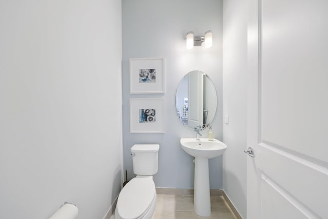 bathroom featuring toilet