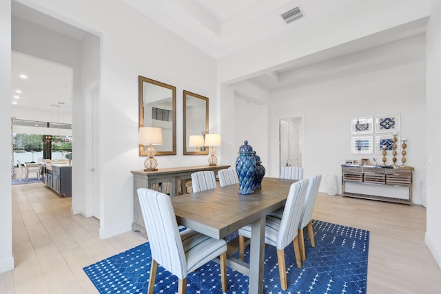 dining room featuring light hardwood / wood-style flooring