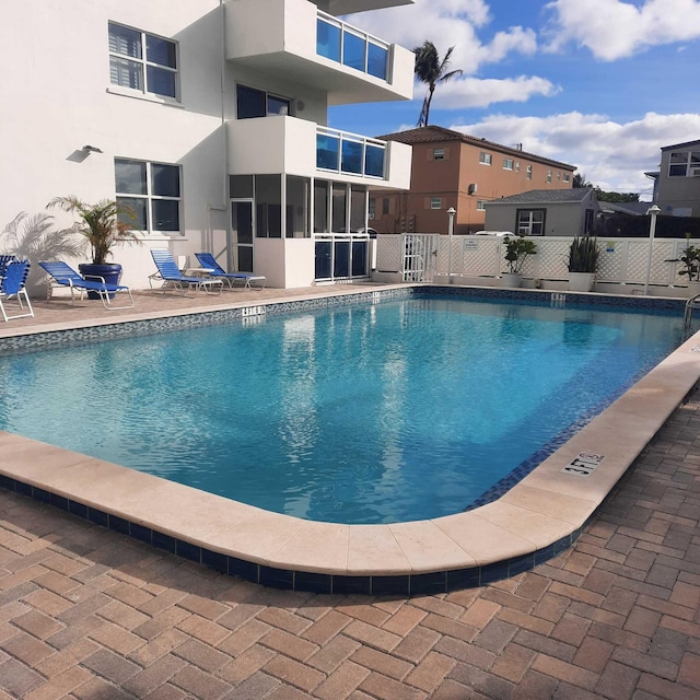 view of pool featuring a patio