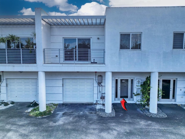 view of property featuring a garage