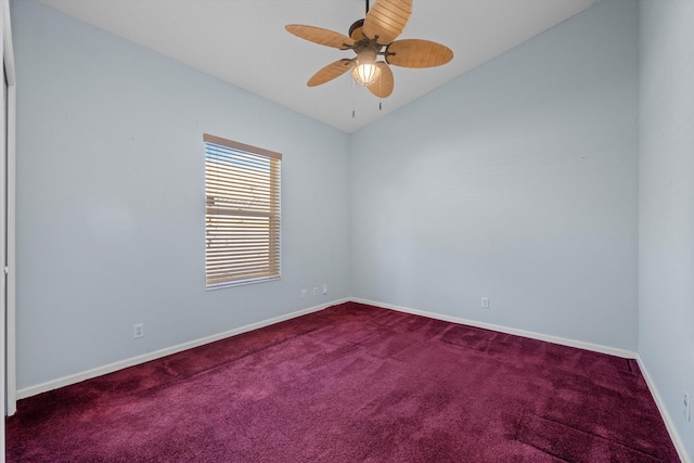 carpeted empty room featuring ceiling fan and lofted ceiling