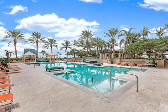 view of pool featuring a gazebo and a patio area