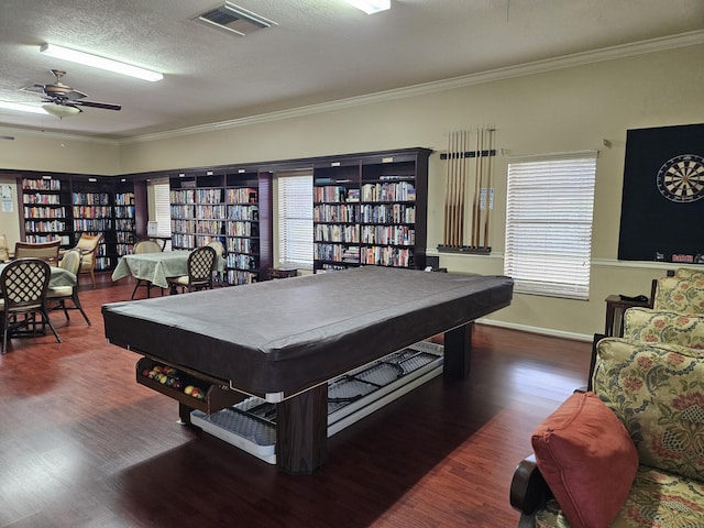 recreation room featuring a healthy amount of sunlight, crown molding, a textured ceiling, and pool table