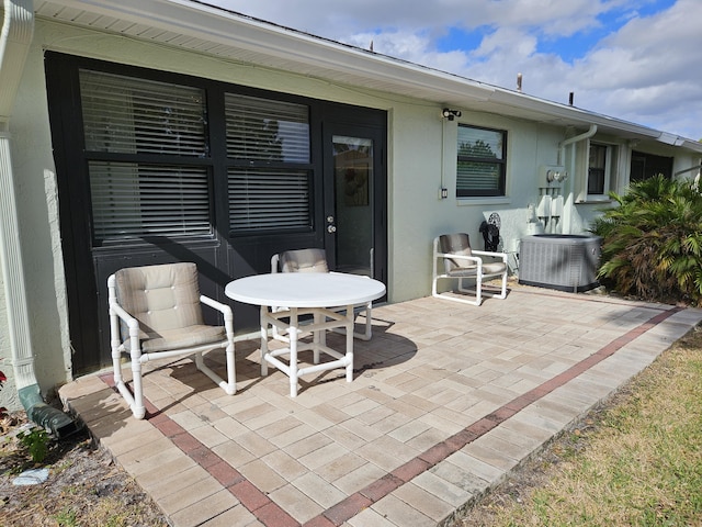 view of patio featuring cooling unit