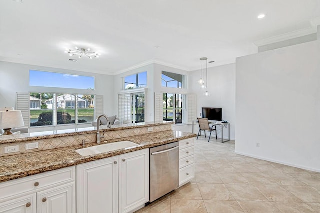 kitchen with light stone counters, stainless steel dishwasher, crown molding, and sink