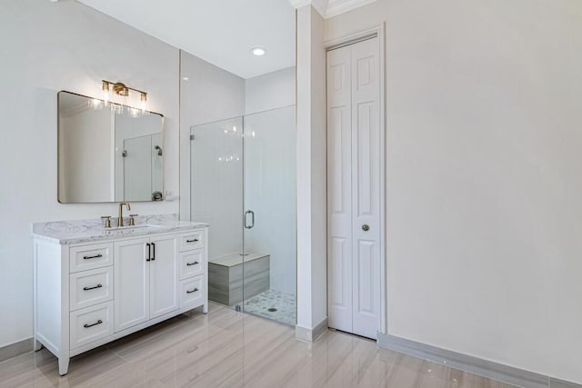 bathroom with hardwood / wood-style floors, vanity, a shower with door, and ornamental molding