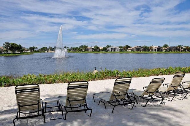 view of patio / terrace with a water view