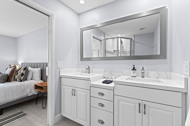 bathroom featuring vanity and walk in shower