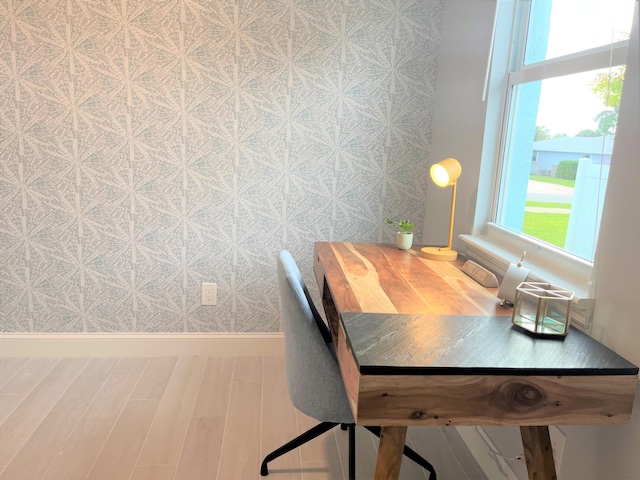 home office featuring hardwood / wood-style floors