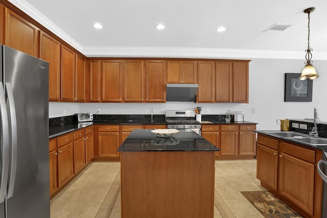 kitchen with sink, hanging light fixtures, ornamental molding, a kitchen island, and stainless steel appliances