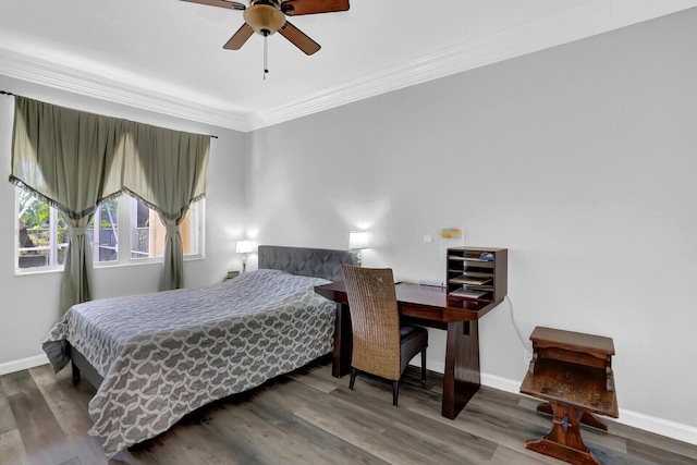 bedroom featuring hardwood / wood-style floors, ceiling fan, and crown molding