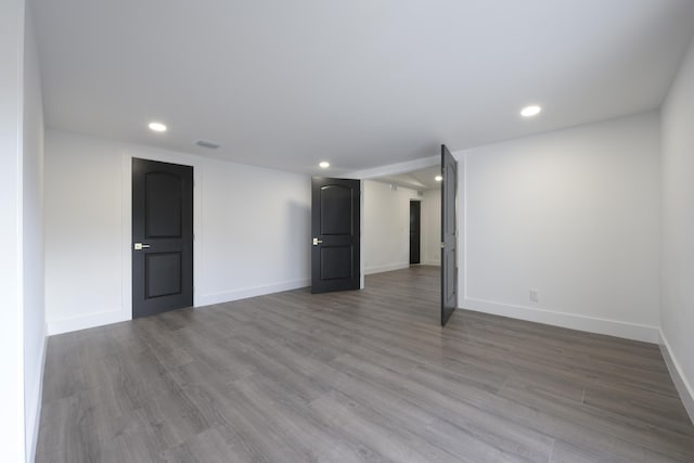 empty room featuring hardwood / wood-style floors