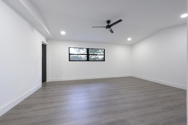 empty room featuring dark hardwood / wood-style floors and ceiling fan