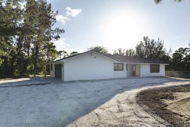 view of front of home with a garage