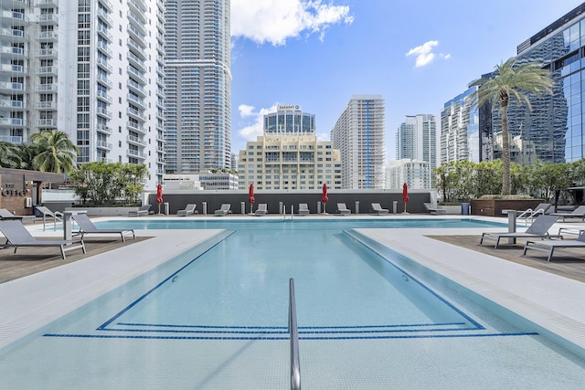 view of swimming pool featuring a patio area