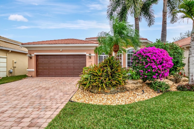 view of front of property with a garage