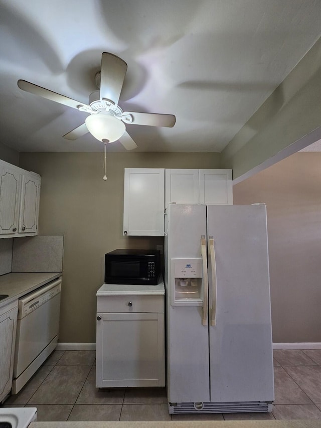 kitchen featuring ceiling fan, white cabinetry, white appliances, and light tile patterned floors