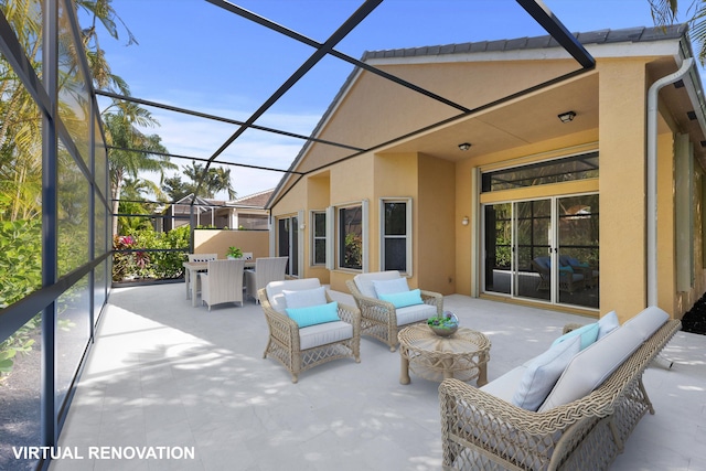 view of patio / terrace featuring a lanai and an outdoor living space