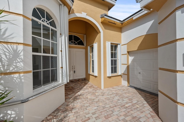 property entrance featuring a garage