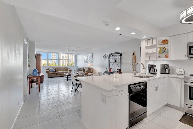 kitchen with dishwasher, kitchen peninsula, sink, ceiling fan, and white cabinetry