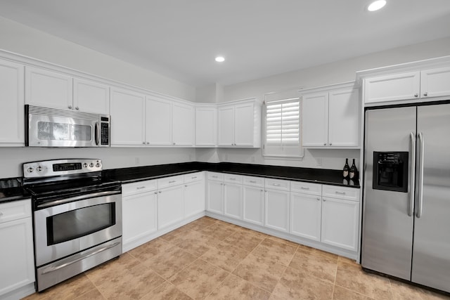 kitchen with white cabinets and stainless steel appliances