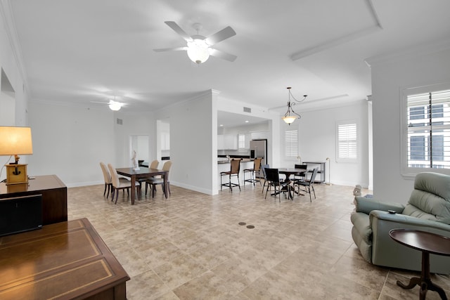 living room with ceiling fan, light tile patterned floors, and crown molding