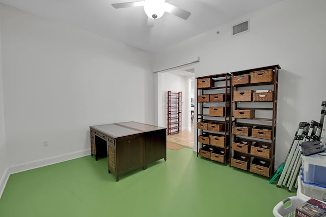 office featuring ceiling fan and concrete flooring