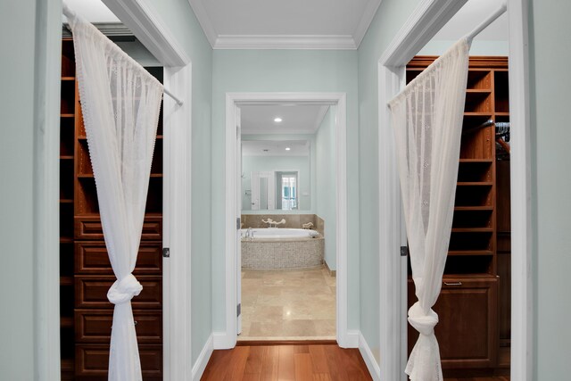 walk in closet featuring hardwood / wood-style floors