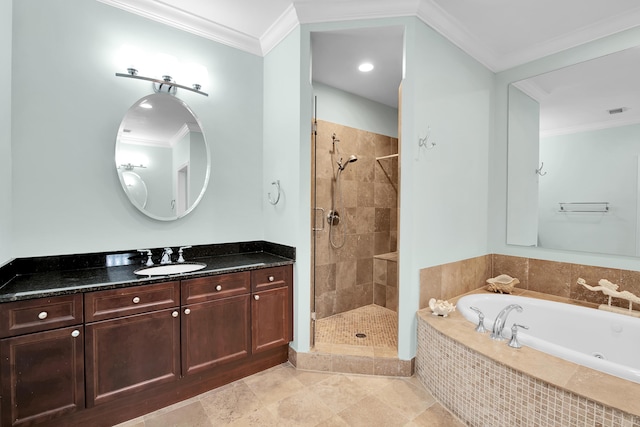 bathroom with vanity, separate shower and tub, and ornamental molding