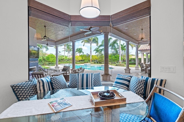 view of patio / terrace featuring ceiling fan