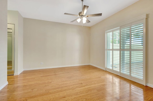 unfurnished room featuring light wood-type flooring, ceiling fan, and baseboards