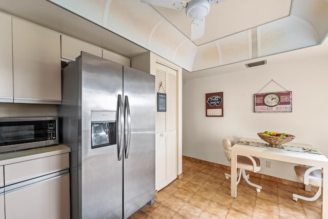 kitchen with white cabinetry and appliances with stainless steel finishes