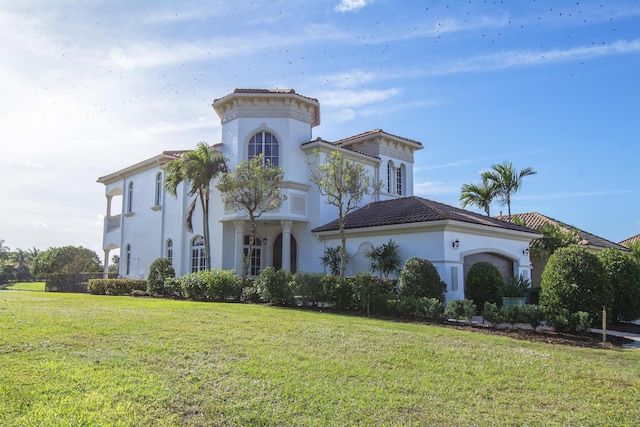 view of front of house with a front lawn