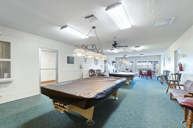 rec room with carpet flooring, ceiling fan, a textured ceiling, and billiards