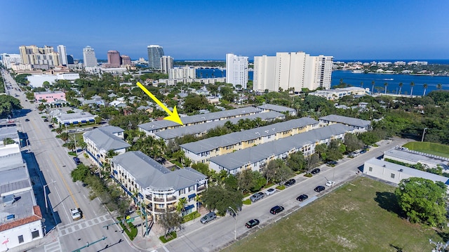 birds eye view of property featuring a water view