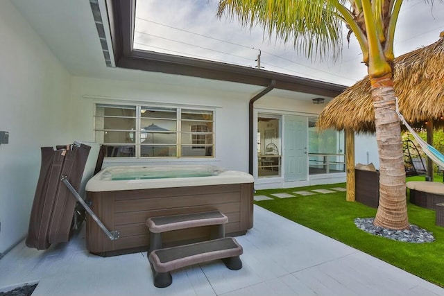 view of patio with a hot tub