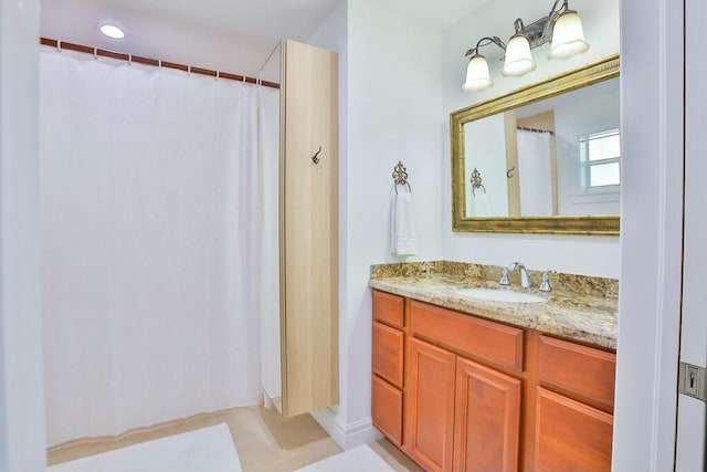 bathroom with vanity and tile patterned floors