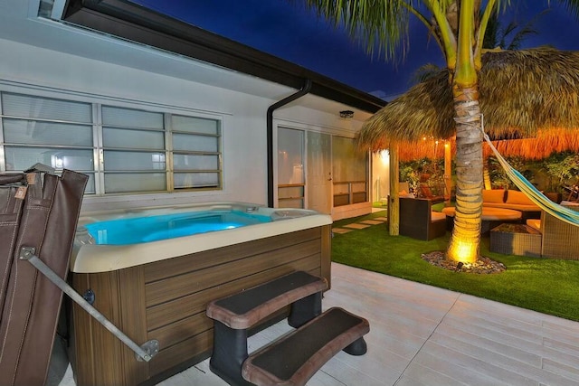 view of patio with a hot tub