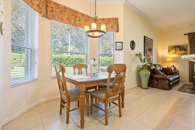 tiled dining room featuring a notable chandelier, a healthy amount of sunlight, and crown molding